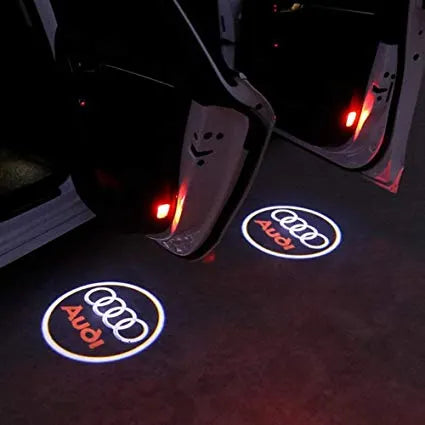 Set 2 Lampi LED Logo Audi pentru Portiere, Proiectie Holograma, 12V, 64x25mm